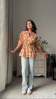 Blossom Breeze Peplum Shirt
